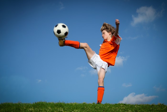 Playing football kids outside bronchiectasis team au exercise